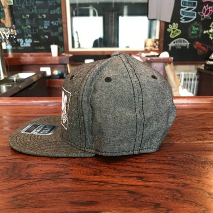 gray flat brim hat side view